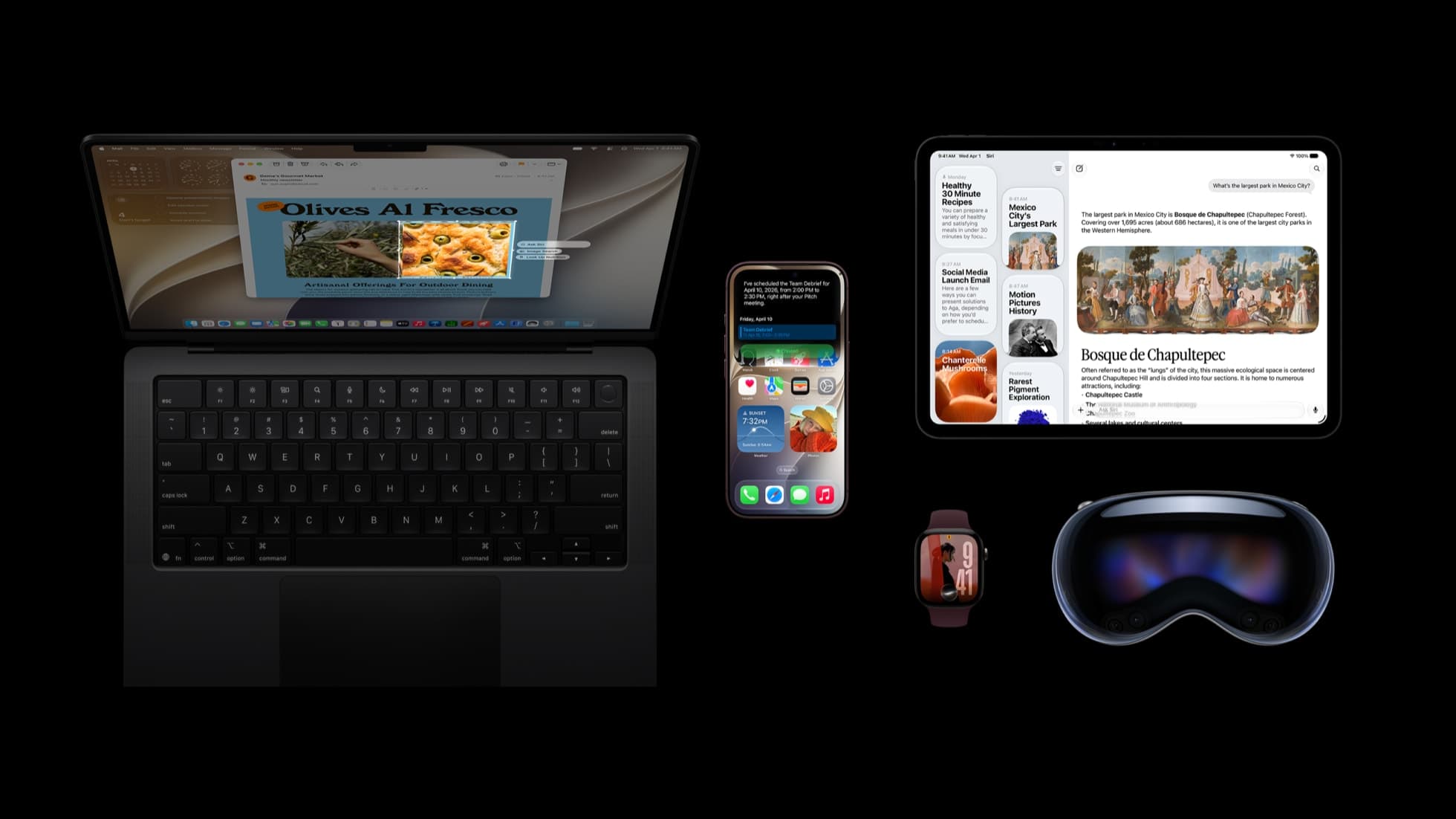 Seen from above on black, a MacBook Pro with its lid open shows a Mail message titled Olives Al Fresco with a Siri popover beside it; to the right sit an iPhone with a calendar notification, an iPad showing a Siri answer about a park in Mexico City, an Apple Watch and an Apple Vision Pro headset.